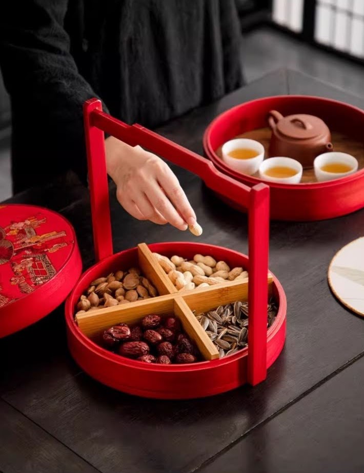 CANDYTRAY-WOOD-REDa Two-Tier Wooden Lunar New Year Candy Box with Red Handle and Brocade Lid